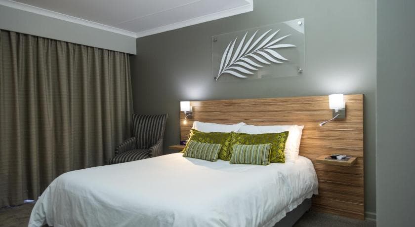 Palm Lodge Bloemfontein guesthouse grounds and rooms